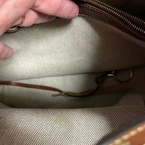 Dooney Bourke Leather Purse. Very little use.. Key fab, lots of pockets